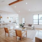 Tidy open-plan living room and kitchen ready for an evening reset