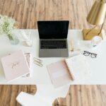 Organized home office desk with laptop and clear workspace