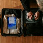 Open suitcase being unpacked at home after a trip