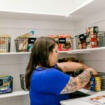 Household supplies arranged on shelves for a simple restock routine