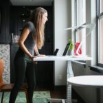 Home office setup that supports standing and movement breaks during desk work
