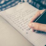 Notebook and checklist used to restart a simple daily habit