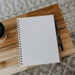 Open notebook and pen used for simple everyday planning decisions