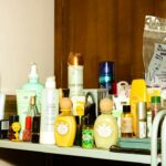 Small bathroom with organized shelving and everyday toiletries